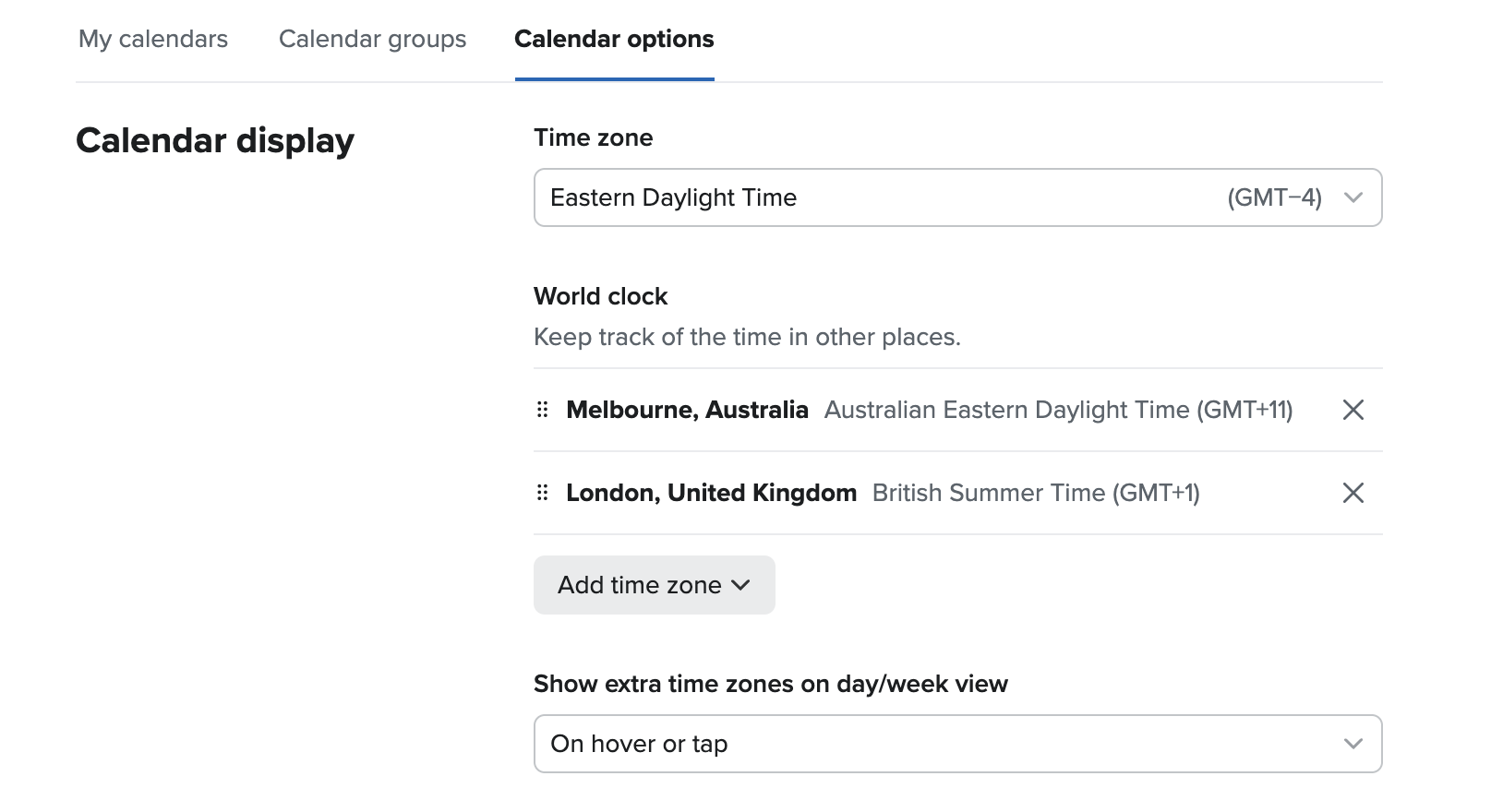 The Calendar options screen in Fastmail, showing the Time zone and World clock options.