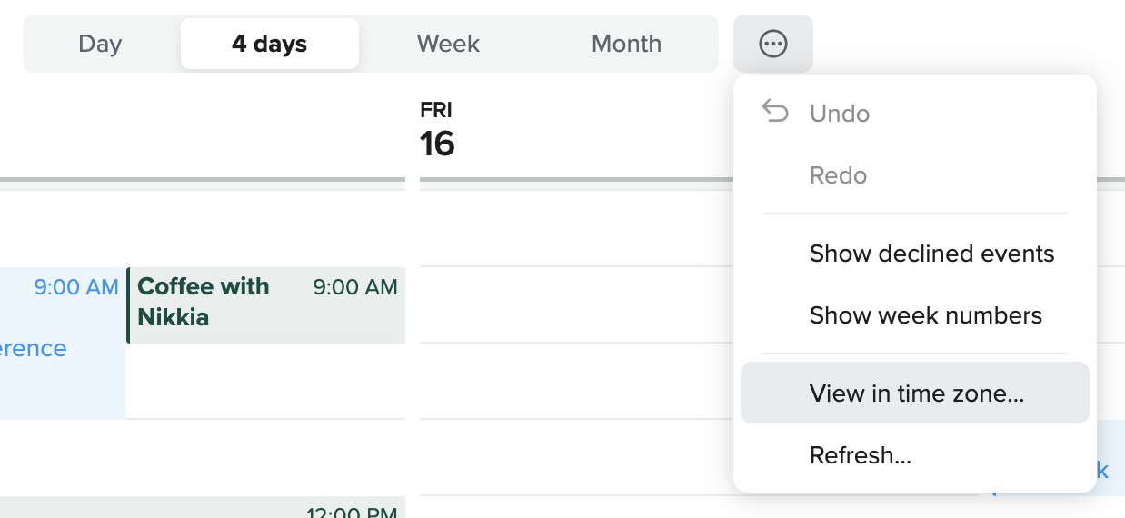 Fastmail calendar with the three-dot menu open next to the calendar view options, showing the ‘View in time zone...’ option.